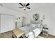 Bedroom with a queen bed, light decor, and ample closet space at 3919 Cape Haze Dr # 506, Rotonda West, FL 33947