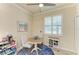 Cozy breakfast nook with round table, bright window, and decorative rug at 6547 Willowshire Way, Bradenton, FL 34212