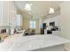 Well-appointed kitchen with white cabinetry, quartz countertops, and stainless steel appliances, perfect for meal prep at 6547 Willowshire Way, Bradenton, FL 34212