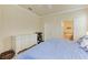 Comfortable main bedroom features a ceiling fan, soft carpet, and a large dresser at 6547 Willowshire Way, Bradenton, FL 34212