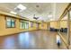 Spacious studio with hardwood floors, mirrors, and natural light, perfect for fitness and dance at 6547 Willowshire Way, Bradenton, FL 34212
