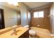 Bathroom with tile shower/tub combo and vanity with sink at 6935 74Th Street E Cir, Bradenton, FL 34203