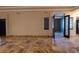 Spacious living room with tile flooring and access to other rooms at 6935 74Th Street E Cir, Bradenton, FL 34203