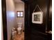 Clean bathroom with toilet and pedestal sink at 6935 74Th Street E Cir, Bradenton, FL 34203