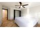 Spacious bedroom with a king-size bed and ceiling fan at 6935 74Th Street E Cir, Bradenton, FL 34203