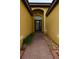Inviting front entry with decorative door and brick walkway at 6935 74Th Street E Cir, Bradenton, FL 34203