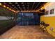 Covered patio with string lights and a ceiling fan at 6935 74Th Street E Cir, Bradenton, FL 34203