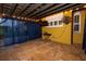 Covered patio with string lights and a ceiling fan at 6935 74Th Street E Cir, Bradenton, FL 34203