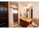 Bathroom features a walk-in shower and single vanity at 6935 74Th Street E Cir, Bradenton, FL 34203