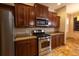 Spacious kitchen featuring stainless steel appliances and granite countertops at 6935 74Th Street E Cir, Bradenton, FL 34203