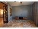 Sunroom featuring tile floors, media console, and French doors at 6935 74Th Street E Cir, Bradenton, FL 34203