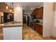 Modern kitchen with stainless steel appliances and granite countertops at 6935 74Th Street E Cir, Bradenton, FL 34203