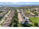 Aerial view of the property with covered parking and lake views at 7201 29Th Avenue W Dr # 309, Bradenton, FL 34209