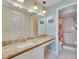 Bathroom featuring a granite countertop vanity, and a step-in shower with grab bars at 7201 29Th Avenue W Dr # 309, Bradenton, FL 34209