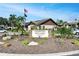 Exterior of Country Village Clubhouse with lush landscaping and signage at 7201 29Th Avenue W Dr # 309, Bradenton, FL 34209
