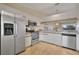 Well-equipped kitchen with granite counters, stainless appliances, and ample cabinet storage at 7201 29Th Avenue W Dr # 309, Bradenton, FL 34209