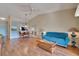 Spacious living room adjacent to the dining area, with hardwood floors and ample natural light at 7201 29Th Avenue W Dr # 309, Bradenton, FL 34209