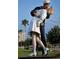 Statue of a sailor kissing a nurse at 1570 Pleasant Rd # J-26, Bradenton, FL 34207