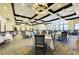 Bright dining room with white tablecloths at 6547 Willowshire Way, Bradenton, FL 34212