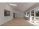 Open concept living area with kitchen views and access to backyard at 2303 89Th Nw St, Bradenton, FL 34209