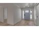 Light and bright entryway with hardwood floors and a view of a modern door at 2303 89Th Nw St, Bradenton, FL 34209
