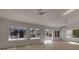 Spacious Gathering room featuring hardwood floors and sliding glass doors at 2303 89Th Nw St, Bradenton, FL 34209