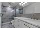 Modern bathroom with double vanity and a walk-in shower at 2303 89Th Nw St, Bradenton, FL 34209