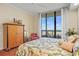 Spacious bedroom with hardwood floors and ample closet space at 1241 Gulf Of Mexico Dr # 708, Longboat Key, FL 34228