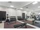 Well-equipped gym with weights, weight benches, and mirrors at 1241 Gulf Of Mexico Dr # 708, Longboat Key, FL 34228