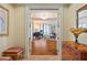 Elegant entryway with hardwood floors, offering a view of the living room at 1241 Gulf Of Mexico Dr # 708, Longboat Key, FL 34228