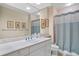 Clean bathroom with updated vanity and shower/tub combo at 1241 Gulf Of Mexico Dr # 708, Longboat Key, FL 34228