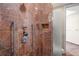 Bathroom with marble shower, grab bars, and modern fixtures at 1241 Gulf Of Mexico Dr # 708, Longboat Key, FL 34228