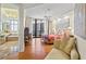 Spacious main bedroom with hardwood floors, large windows, and en-suite bathroom at 1241 Gulf Of Mexico Dr # 708, Longboat Key, FL 34228