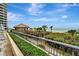 Elevated walkway to the beach with ocean views at 1241 Gulf Of Mexico Dr # 708, Longboat Key, FL 34228