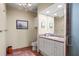Bathroom with single vanity, toilet and shower at 1241 Gulf Of Mexico Dr # 708, Longboat Key, FL 34228