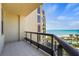 Spacious balcony overlooking the ocean and resort amenities at 1241 Gulf Of Mexico Dr # 708, Longboat Key, FL 34228
