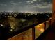 Night view from balcony overlooking city lights at 1241 Gulf Of Mexico Dr # 708, Longboat Key, FL 34228