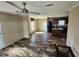 Open kitchen with island, dark cabinets and stainless steel appliances at 705 50Th Avenue W Dr, Bradenton, FL 34207