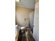 Bathroom with shower stall, toilet, and wood-look floors at 705 50Th Avenue W Dr, Bradenton, FL 34207