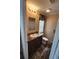 Clean bathroom with vanity, toilet, and shower/tub combination at 705 50Th Avenue W Dr, Bradenton, FL 34207