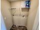 Laundry room with shelving and hookups for washer and dryer at 705 50Th Avenue W Dr, Bradenton, FL 34207