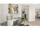 Home office with a desk, window light, and view into the kitchen and dining area at 3442 Fairview Dr, Sarasota, FL 34239