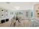 Modern dining room with an oval table and stylish chairs at 3442 Fairview Dr, Sarasota, FL 34239