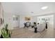 Bright and airy living room with contemporary furniture and hardwood floors at 3442 Fairview Dr, Sarasota, FL 34239