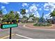 Coconut Avenue street view with a circular plaza and sculptures at 3442 Fairview Dr, Sarasota, FL 34239