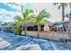 Exterior of the bar with a tiki hut at 3442 Fairview Dr, Sarasota, FL 34239