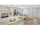 Modern kitchen with stainless steel appliances and white shaker cabinets at 3442 Fairview Dr, Sarasota, FL 34239