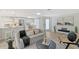 Open living room, seamlessly connected to the kitchen and dining area at 3442 Fairview Dr, Sarasota, FL 34239