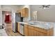 Eat-in kitchen with granite countertops and stainless steel appliances at 10444 48Th E Ct, Parrish, FL 34219