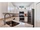 Updated kitchen featuring granite countertops and stainless steel appliances at 15967 Clear Skies Pl, Lakewood Ranch, FL 34211